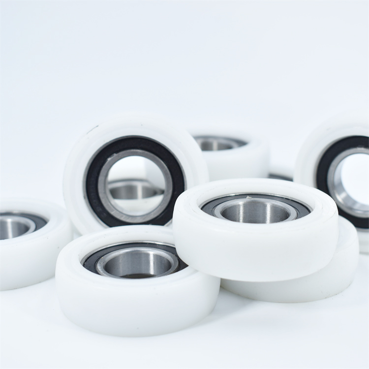 BSR690340-10 17x40x10mm Polyformaldeh Coated Round Roller 40mm Diameter 10mm Bore POM Track Guide Wheel Plastic Bearing.jpg
